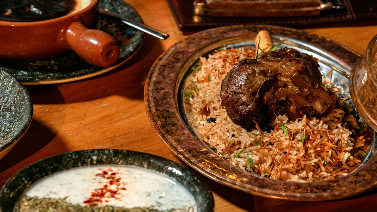 Crafting Captivating Headlines: Your awesome post title goes here Appetizing lamb biryani served with rice and spices in a traditional setting.
